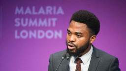 Elvis Eze speaking at the Malaria Summit London